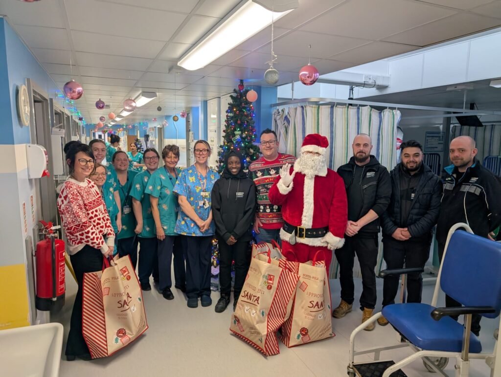 The current image has no alternative text. The file name is: Father-Christmas-at-James-Paget-Hospital-1.jpg