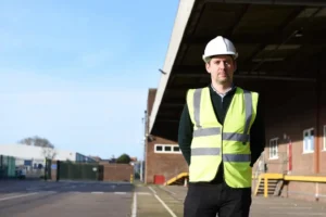Cllr Chris Chambers at the site in Whittle Road